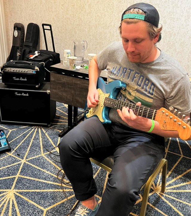 Kevin playing guitar